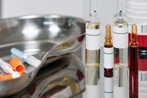 Medical Vials over Stainless Surface